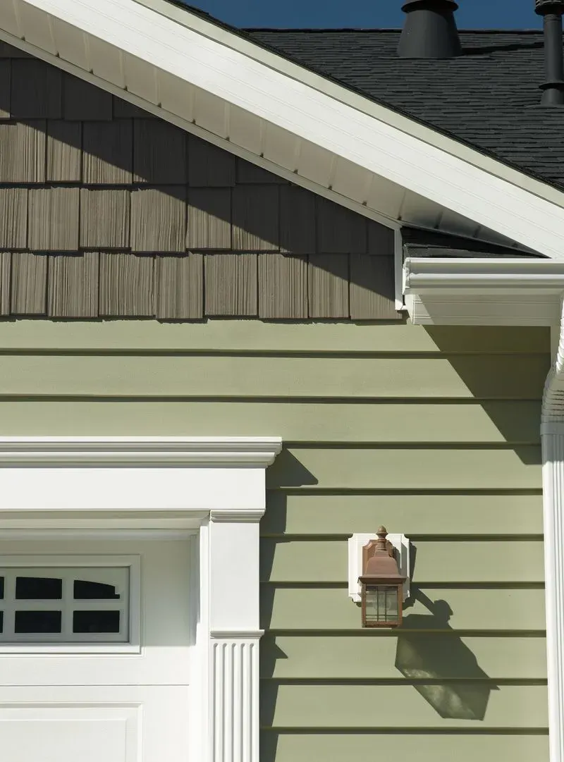 Close view of new siding on a Legacy job